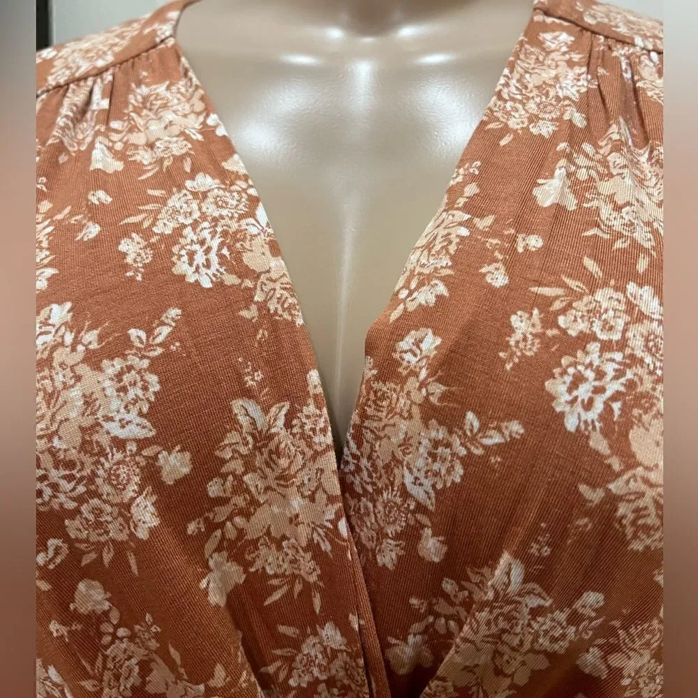 NWT-FREE PEOPLE Turnt Bodysuit